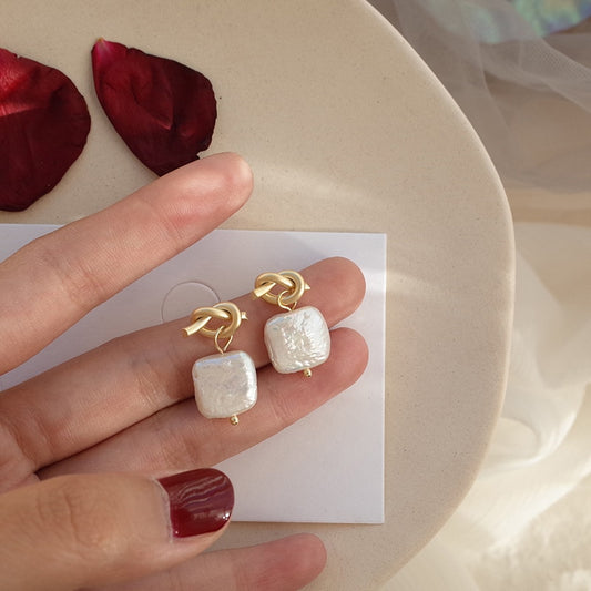Natural pearl earrings by edenista