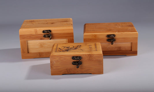 Set of three bamboo wooden jewelry boxes with metal clasps