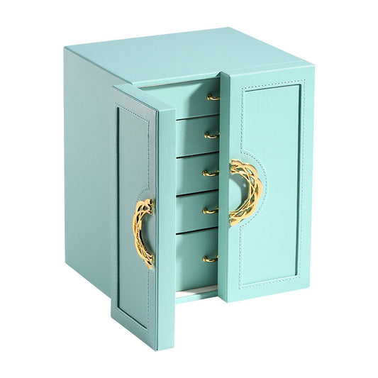 Leather jewelry box by edenista in teal with gold hardware and five drawers.