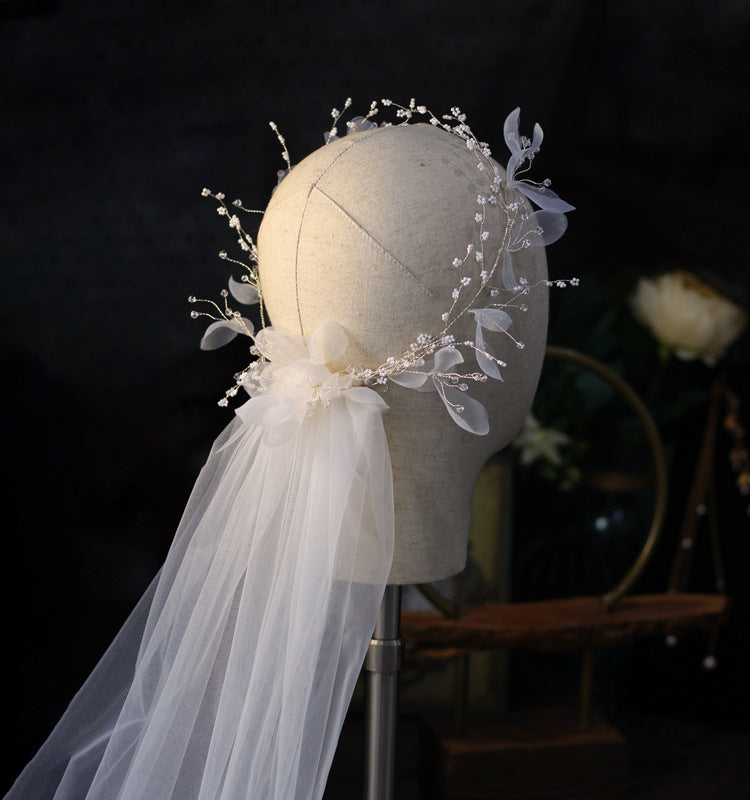 Bridal wreath veil headpiece by CJ with crystal bead vines and sheer tulle veil