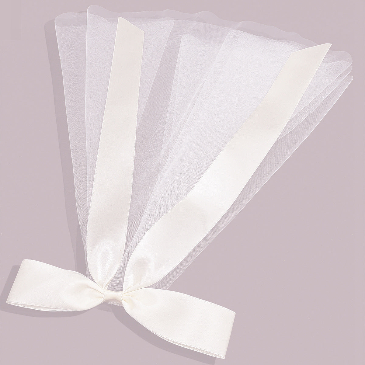 Ladies fashion ribbon bridal veil, short length in layered white tulle with a white satin ribbon bow
