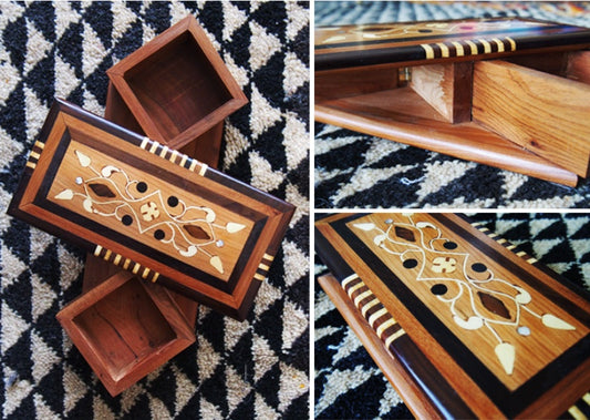 Moroccan handmade rotating wooden jewelry box with intricate inlay lid and two inner boxes.