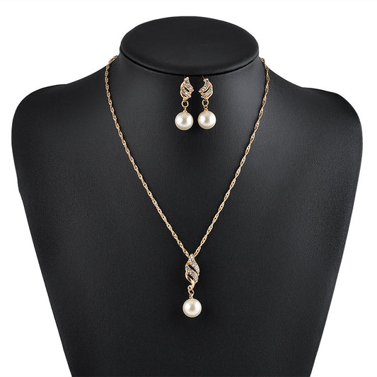Pearl necklace and matching pearl drop earrings set with gold-tone chain and crystal-accent pendant
