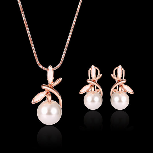 3-piece pearl necklace and earrings set in rose gold with leaf accents