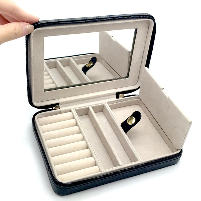 edenista portable black jewelry box with beige interior, mirror, ring cushions and compartments