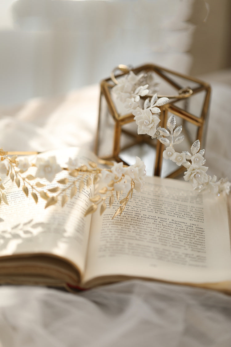 Hair band with gold and silver leaves and white ceramic flowers