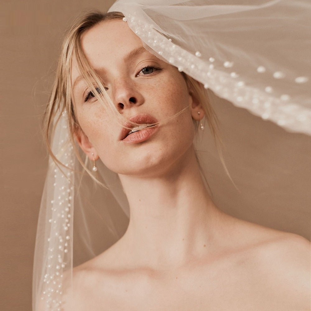 Beading mesh bridal veil by CJ; sheer white tulle with pearl bead accents.