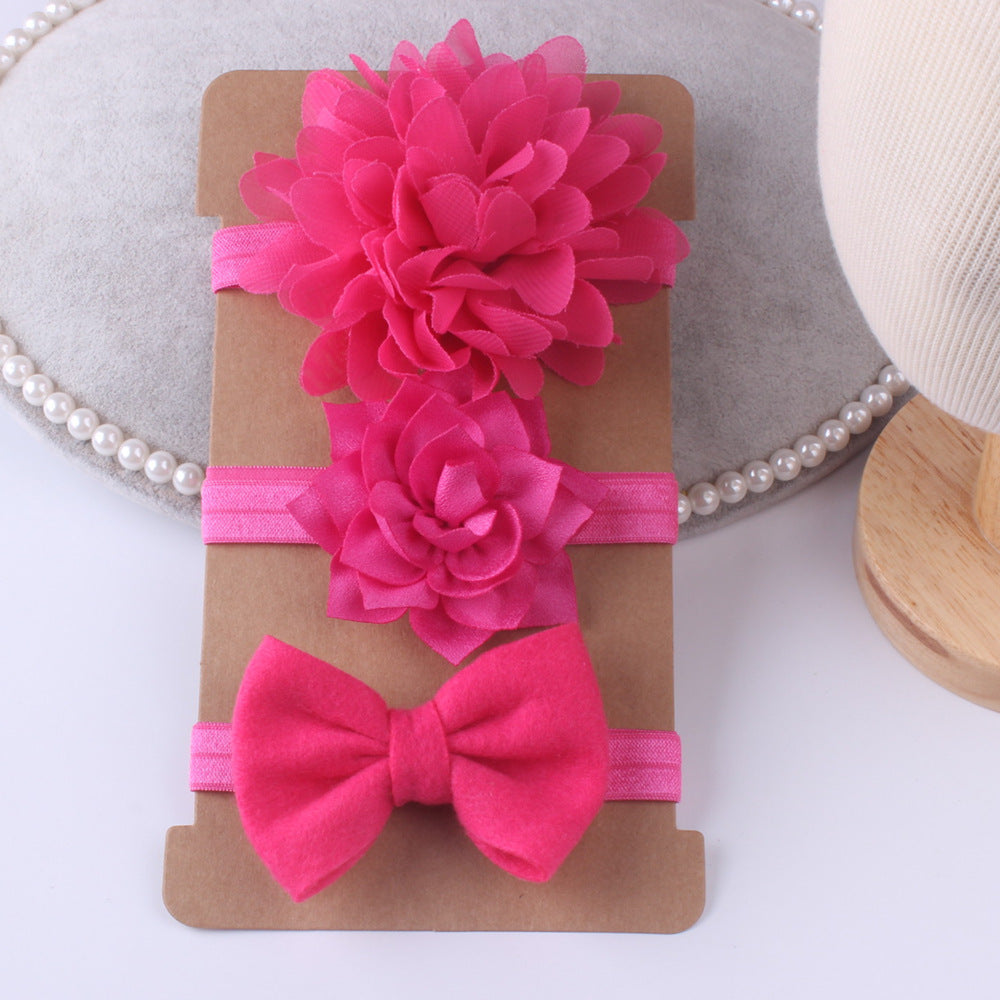Three-piece CJ pink floral baby stretch hairbands with fabric flowers and bow