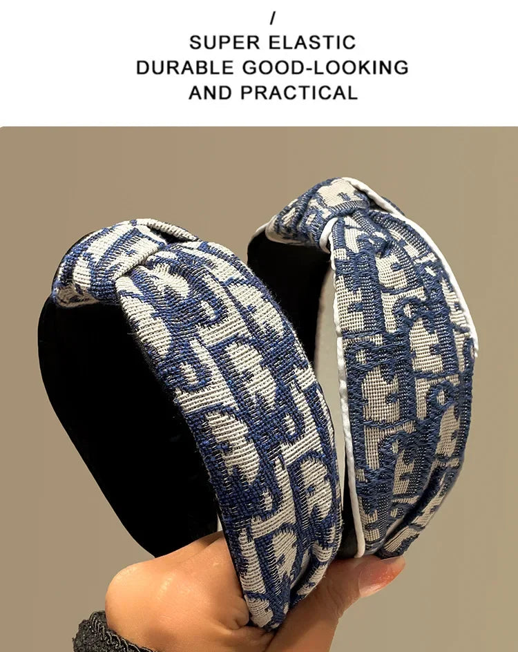 Headbands by Edenista, pair of blue and white patterned fabric, retro cowboy-style, padded outdoor hair accessories.
