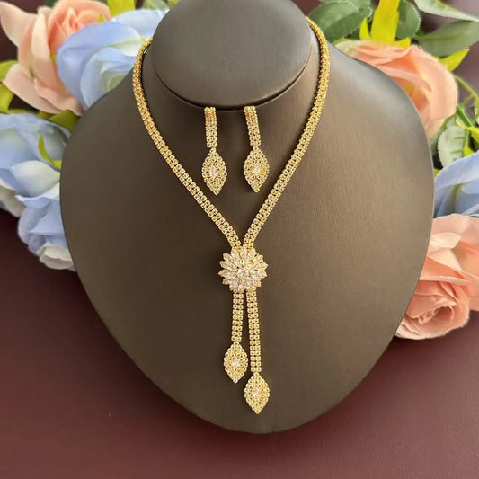 A three piece jewelry set with exquisite patterns and stunning necklaces and earrings, perfect for parties and banquets