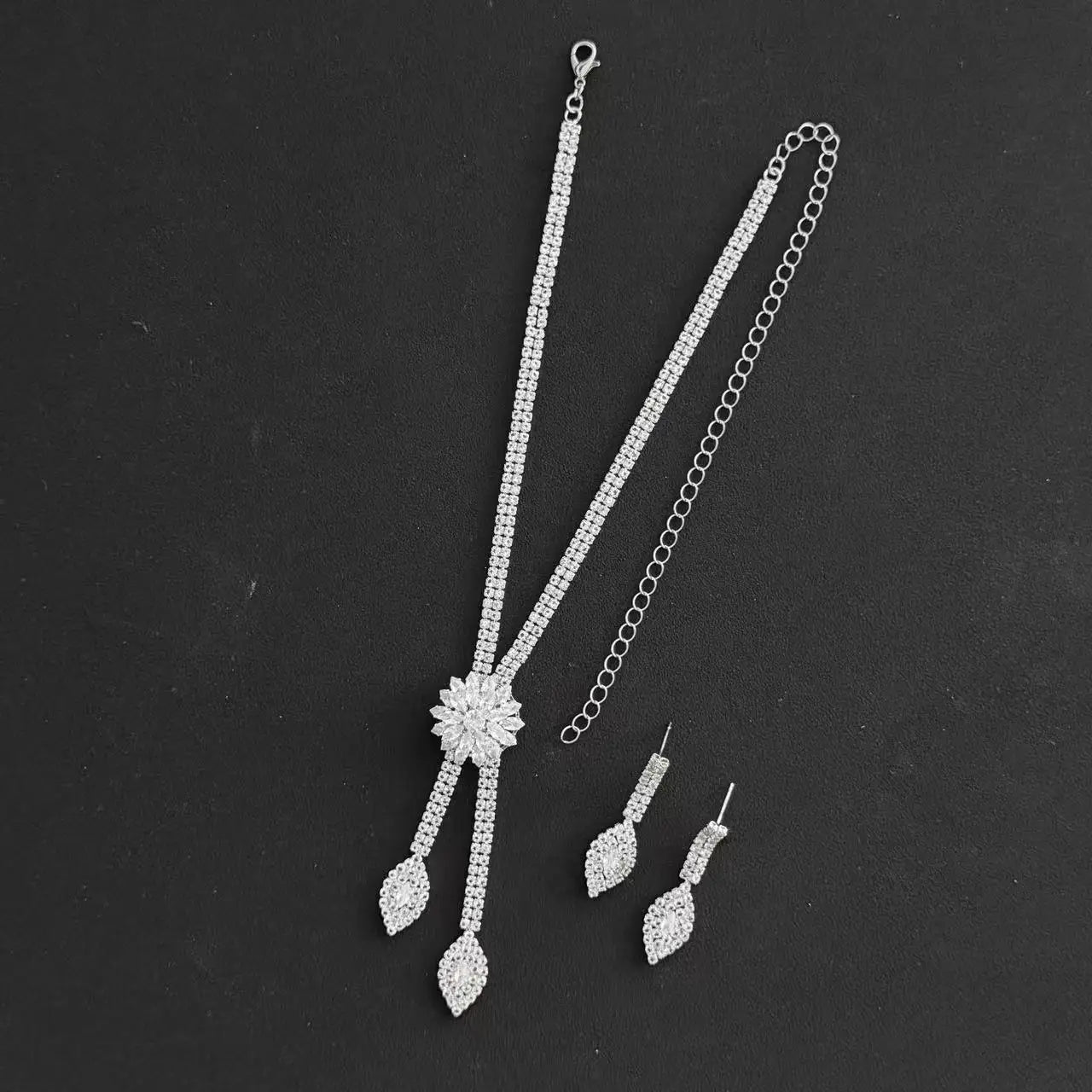 Three piece jewelry set with exquisite patterns and stunning necklaces and earrings by edenista