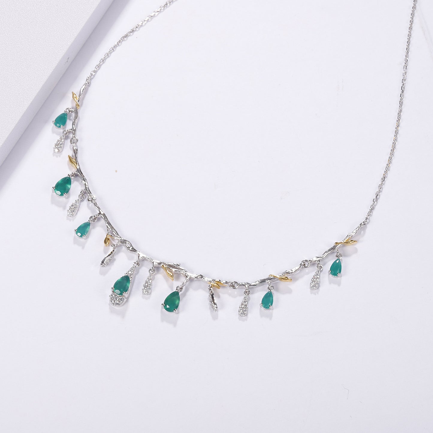 S925 silver natural topaz necklace with green teardrop topaz charms and clear crystals along a branch-like chain
