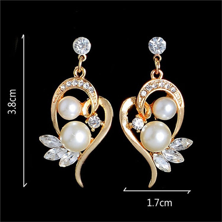 Pearl drop earrings in gold-tone with crystal accents; bridal jewelry pair