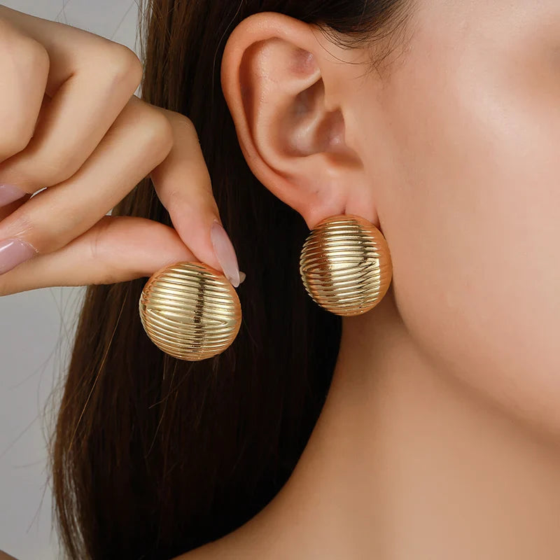 Gold-plated stainless steel stud earrings UK - how to care for gold-plated jewellery