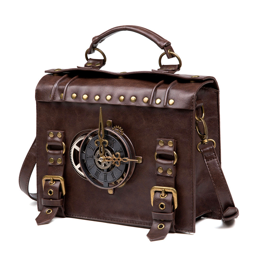 Brown leather steampunk shoulder bag with vintage clock gear design, buckle straps, and top handle unique retro crossbody statement piece.