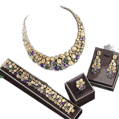 Exaggerated necklace and earrings wedding set, 4-piece gold-tone with purple and green stones by CJ