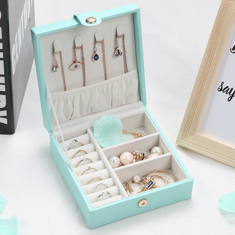 Jewelry storage box, square turquoise PU leather, portable with ring and bracelet compartments, holds multiple pieces
