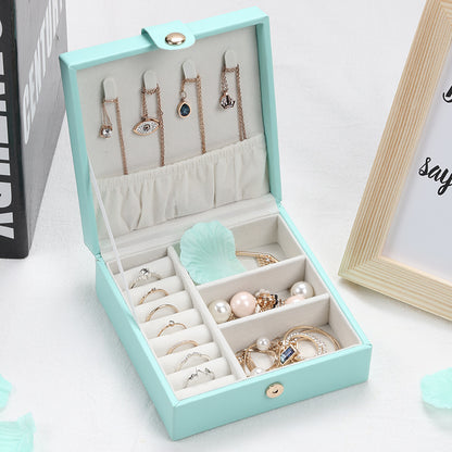 Jewelry storage box, square turquoise PU leather, portable with ring and bracelet compartments, holds multiple pieces