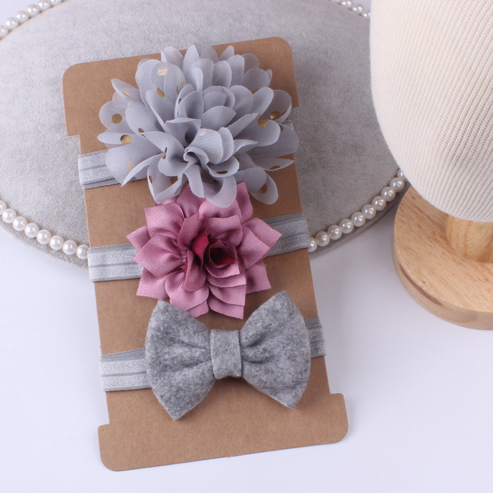 Three-piece floral simple baby stretch hairband set with light gray flower, pink flower, and gray bow by cj