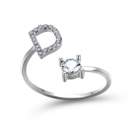 Ring set: two adjustable silver rings, one features a pave-crystal open halo, the other a prong-set solitaire stone.