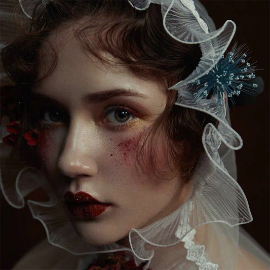 Vintage white fairytale bridal lace veil with sheer ruffled edge worn by model