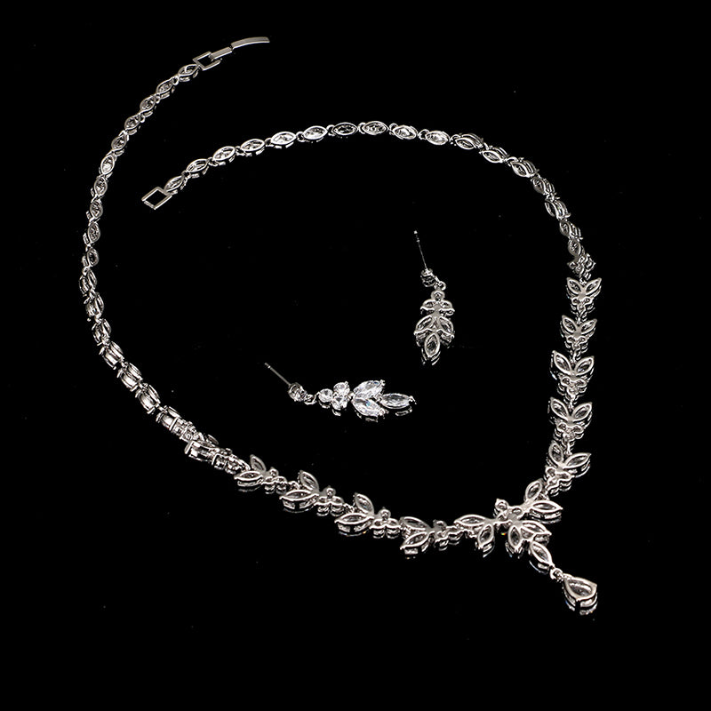 Zircon Simple Bridal Set by cj in silver-tone; 3-piece necklace, bracelet, and earrings.