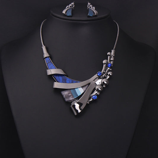 Jewelry set by cj: geometric blue and silver necklace with matching earrings