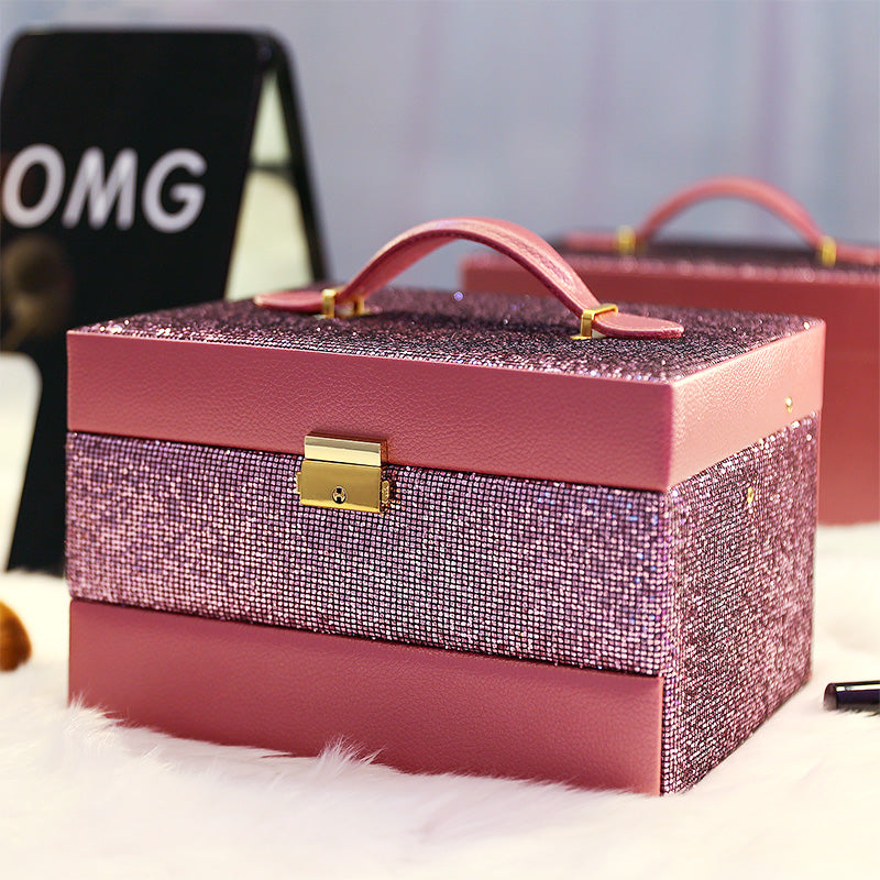 edenista pink glitter jewelry box organizer with gold latch and handle; two boxes visible