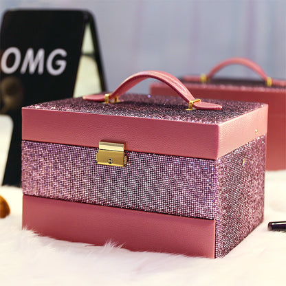 edenista pink glitter jewelry box organizer with gold latch and handle; two boxes visible
