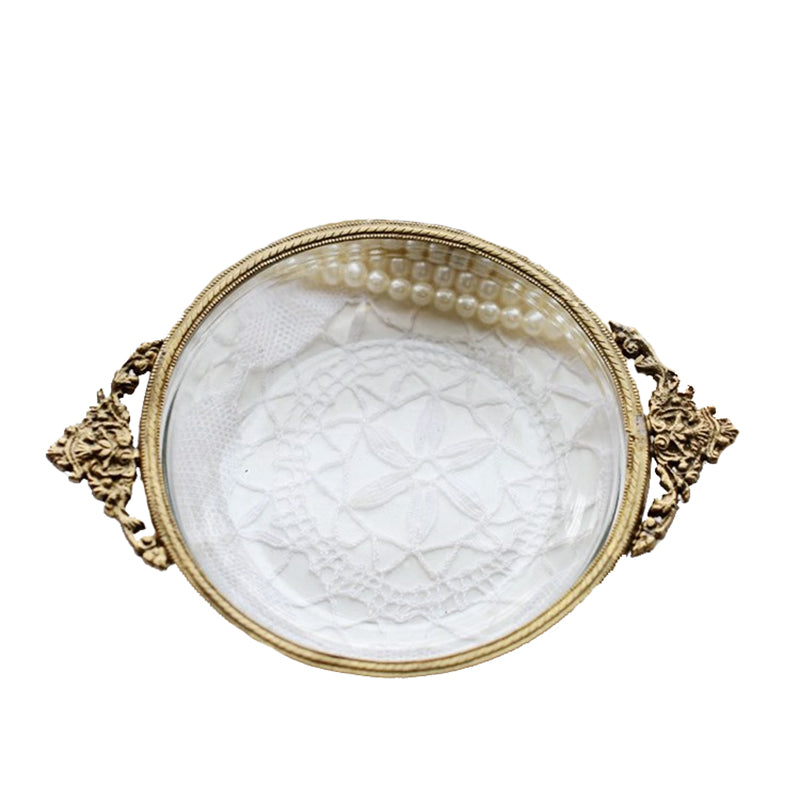 Handmade brass-edged round jewelry box by Edenista with ornate side handles and lace interior, pearl necklace inside.