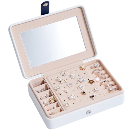 Jewelry storage box for earrings and rings with pink interior and built-in mirror