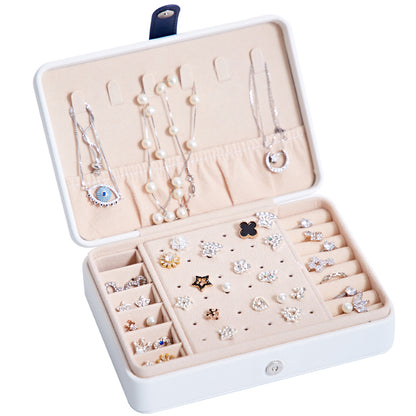 Edenista jewelry storage box for earrings and rings, white exterior with blush interior and organized compartments.