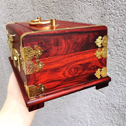 Portable edenista mahogany jewelry box with ornate gold-tone hardware and latch