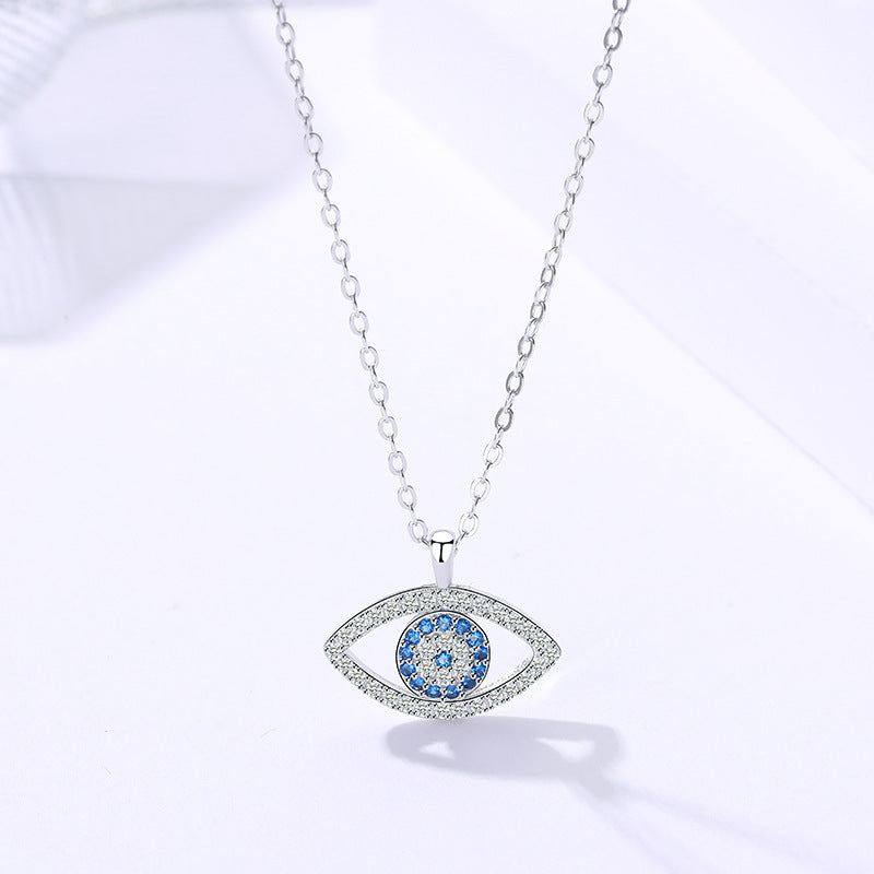 s925 sterling silver demon eye pendant necklace with blue center stones and pave outer ring
