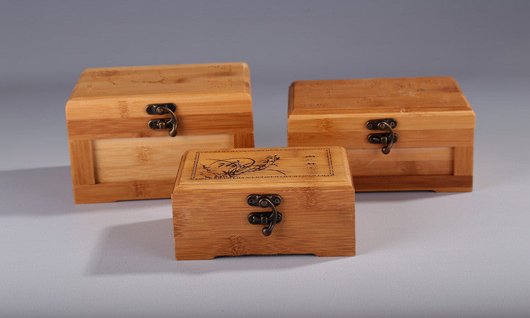 Set of three bamboo wooden jewelry boxes with metal clasps