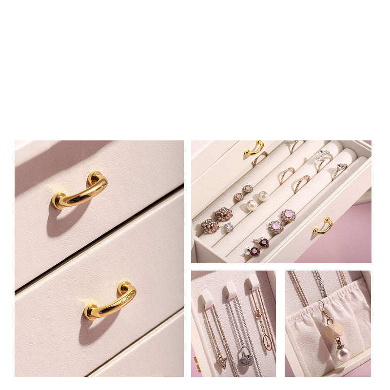 Leather jewelry box in blush pink with gold hardware by edenista; organized rings, earrings, and necklaces.