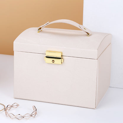 Double-layer PU leather jewelry box in cream with gold hardware and a carrying handle