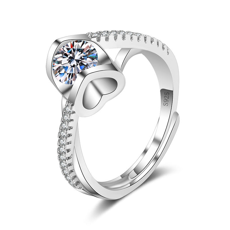 Women's S925 sterling silver ring with a large round moissanite centerpiece and pavé-studded band