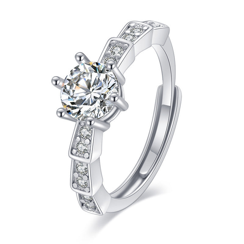 CJ women's imitation moissan diamond ring with a solitaire center stone and pave-set band in silver-tone