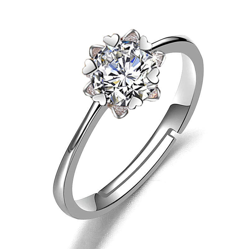 Imitation moissan diamond ring by cj with heart-shaped halo on a silver band