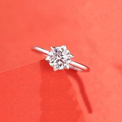Female Ring Imitation Moissan Diamond Ring with silver-tone band and round center stone