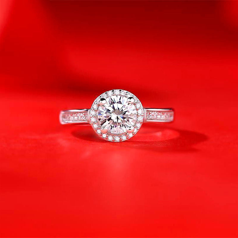 CJ women's imitation moissan diamond halo ring, silver-tone band with pave stones