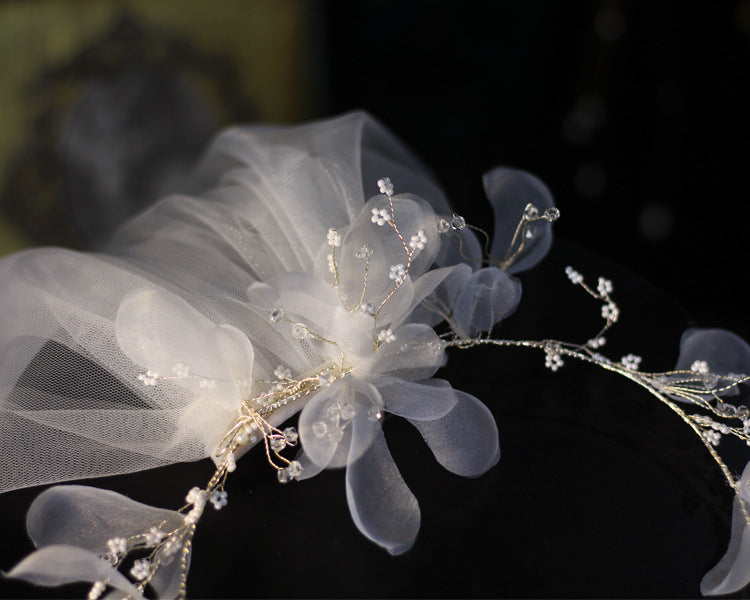 Bridal wreath veil with white tulle petals and crystal bead accents