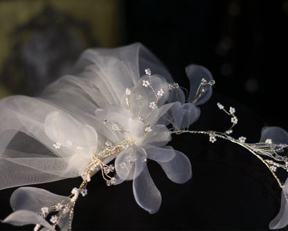 Bridal wreath veil with white tulle petals and crystal bead accents