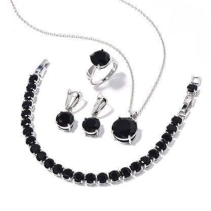 Geometric round jewelry set by cj: black stones on silver-tone metal with bracelet, necklace, ring and earrings