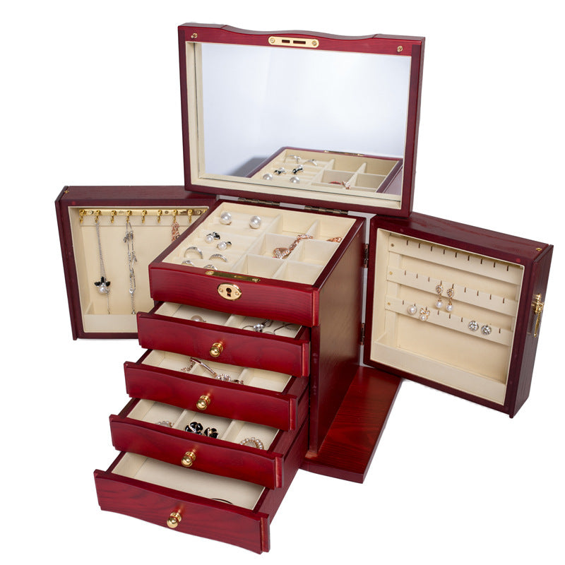 Wooden jewelry box by edenista, red finish with mirrored lid and multiple storage drawers.