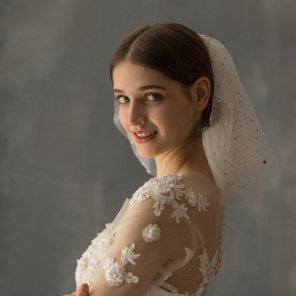 White yarn bridal multi-layer short veil by CJ with star accents.