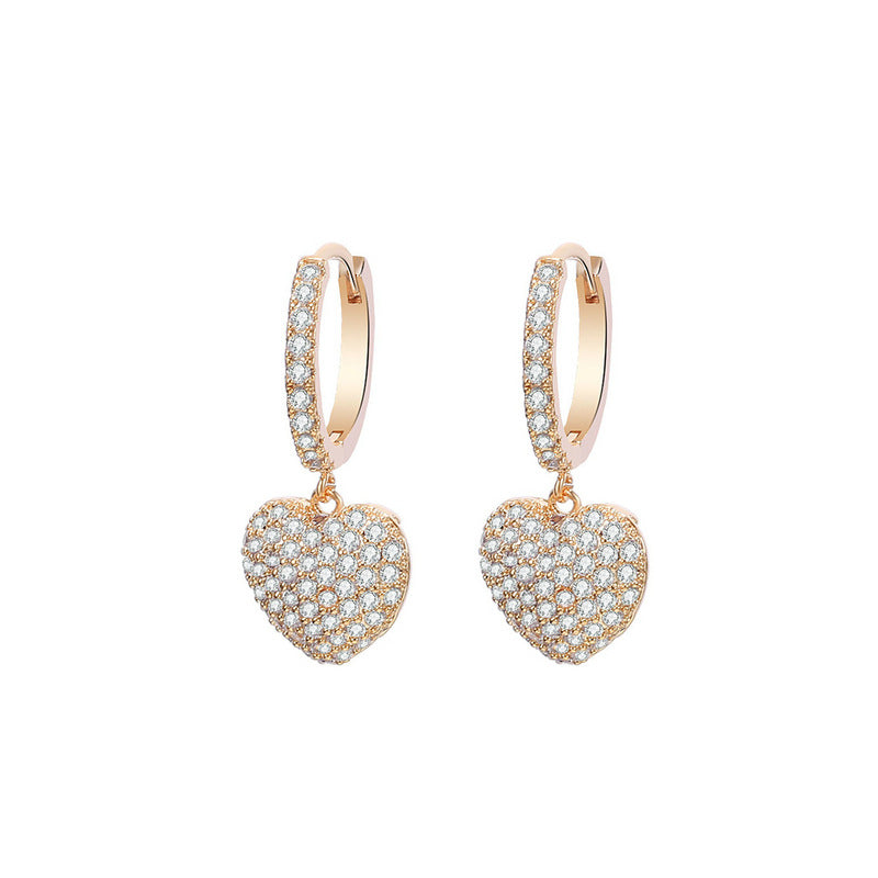Personalized wild copper zirconium diamond earrings; rose gold-tone hoops with pave heart diamonds, pair