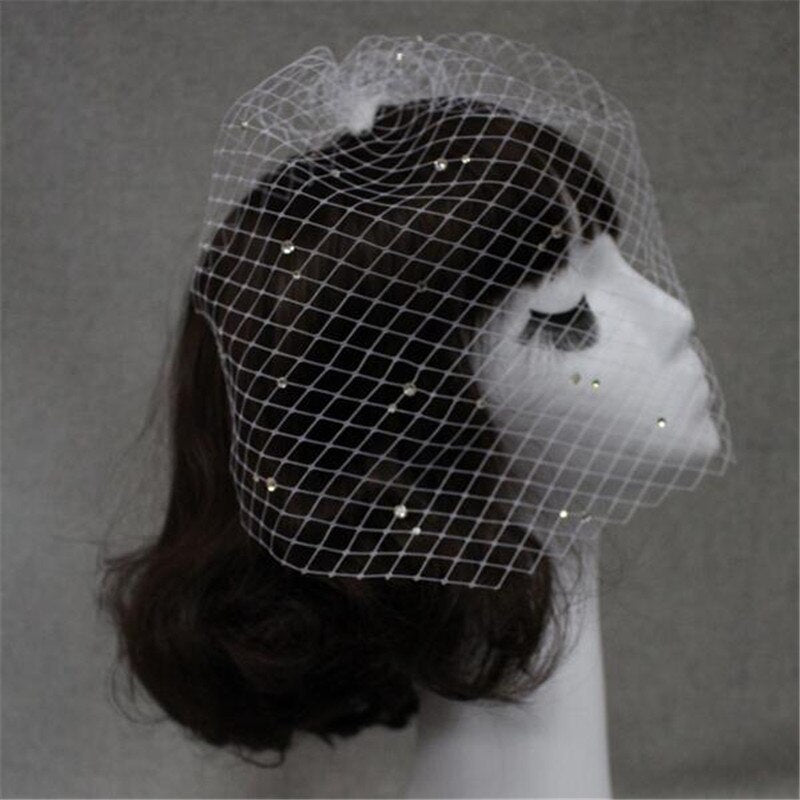 Bridal veil with rhinestone accents on white large-hole mesh and hand-sewn hair comb accessory