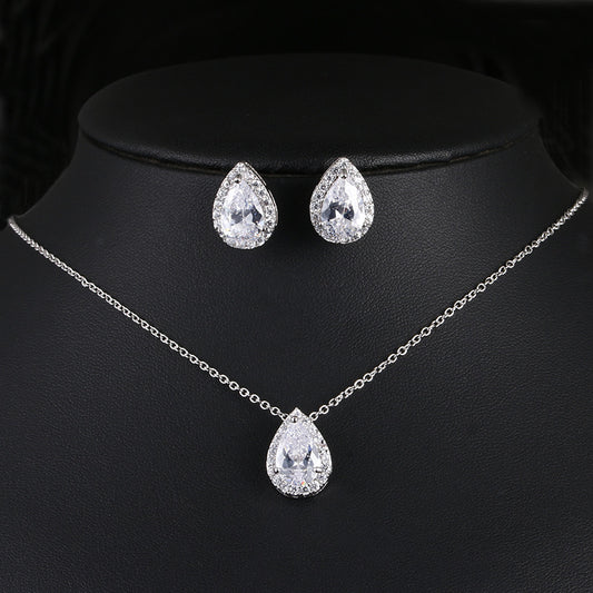 Water drop gemstone jewelry set: silver-tone necklace with teardrop pendant and pair of teardrop earrings.